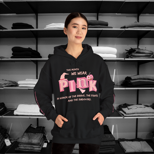 HeartFelt Hoodies Breast Cancer Awareness Hoodies Collection image of a young woman wearing one of our black hoodies with bright pink wording