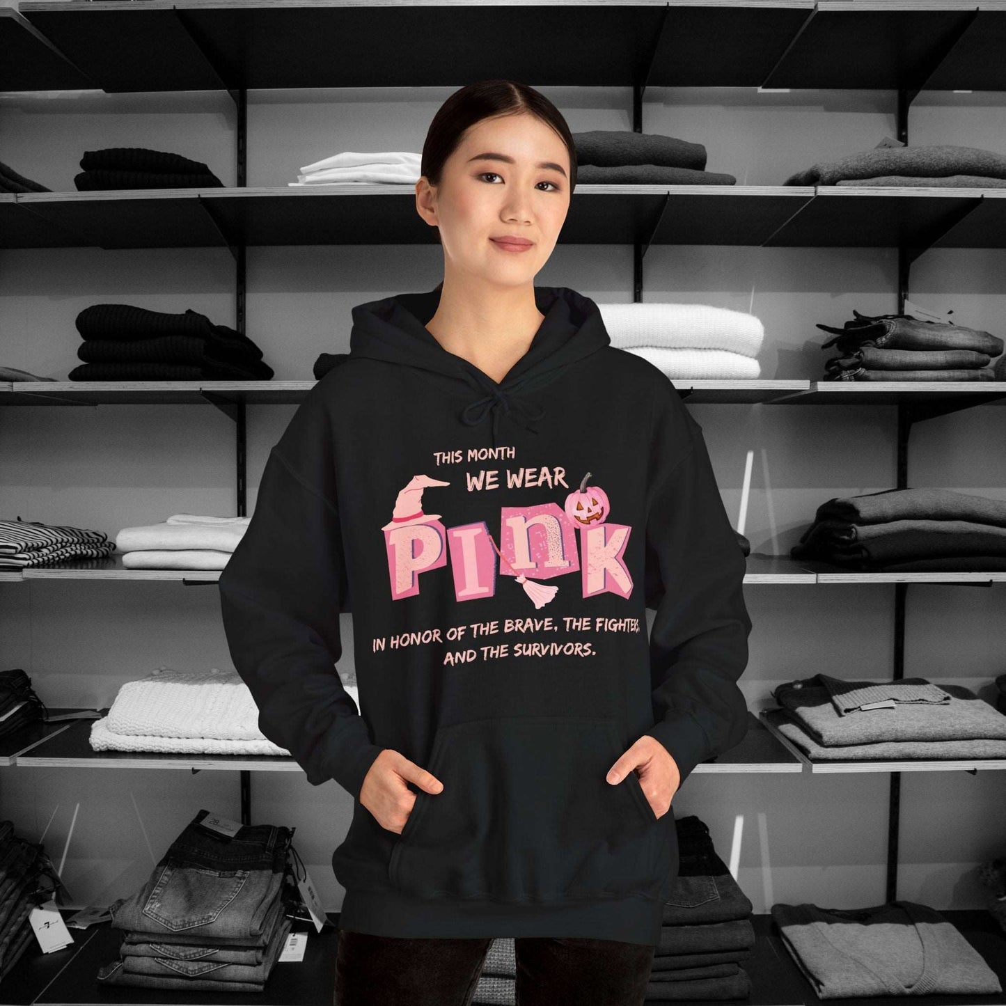 Breast Cancer Awareness Hoodie -This Month We Wear Pink. Stand strong in this empowering hoodie that speaks to both the inner and outer strength of canser sufferers.