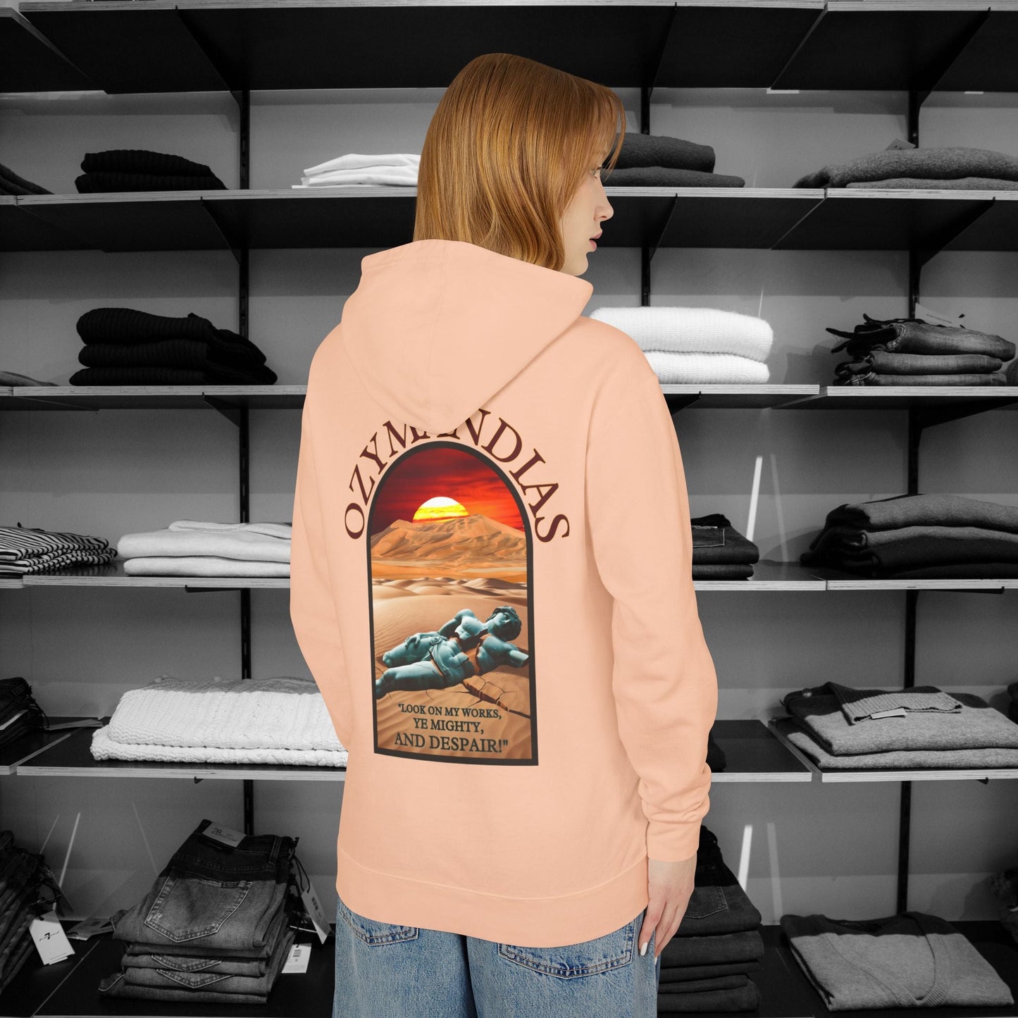 Percy Bysshe Shelley's "Ozymandias" our poetry clothing features a vivid desert sunset, a fallen statue, and the quote,  "Look on my works, ye mighty, and despair". 