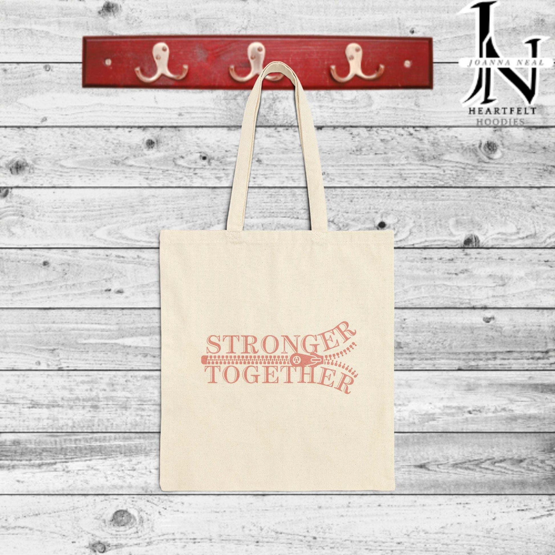 Gentle Reminders for Tough Days Anxiety can feel overwhelming, but a simple reminder can make all the difference. This Breast Cancer Awareness  Cotton Canvas Tote Bag