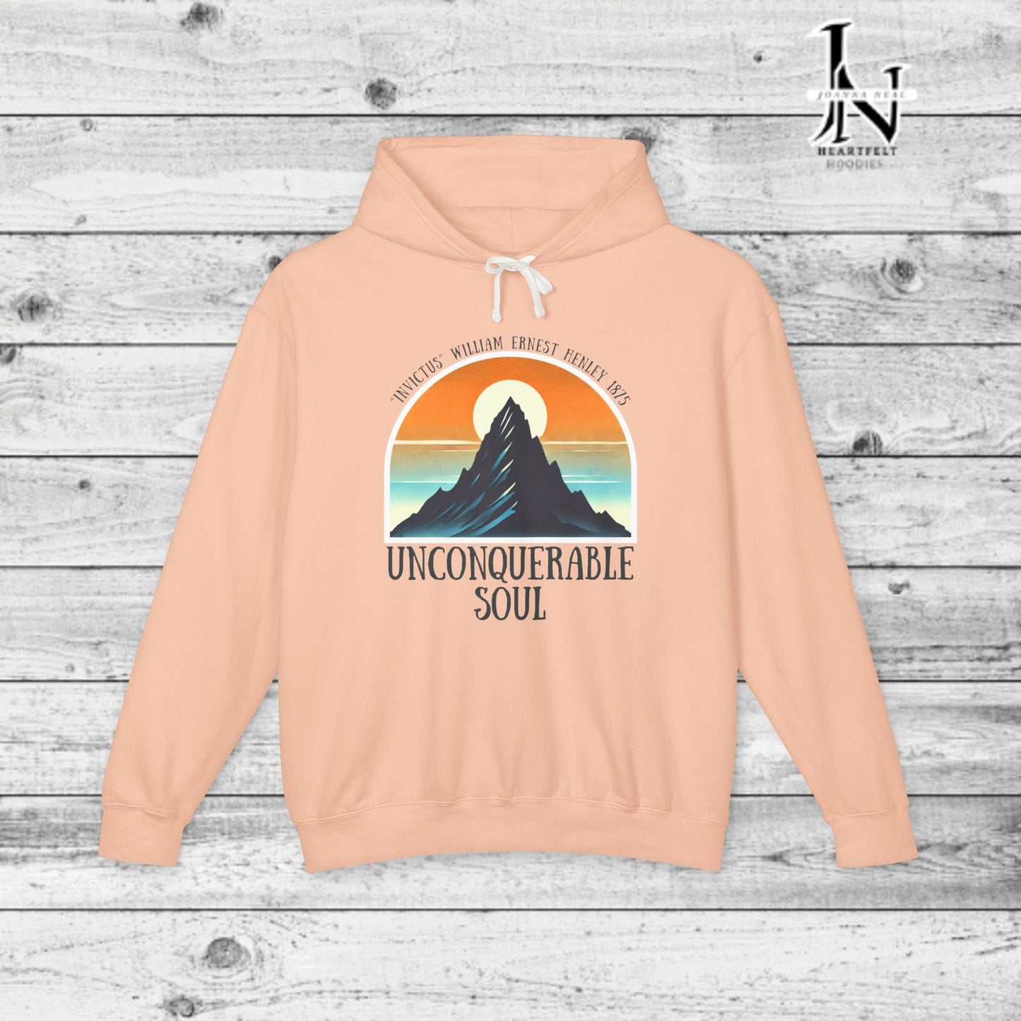 This Piece of Poetry Clothing features a bold and motivational statement: "I am the captain of my soul," paired with a stunning mountain scene under a rising sun.