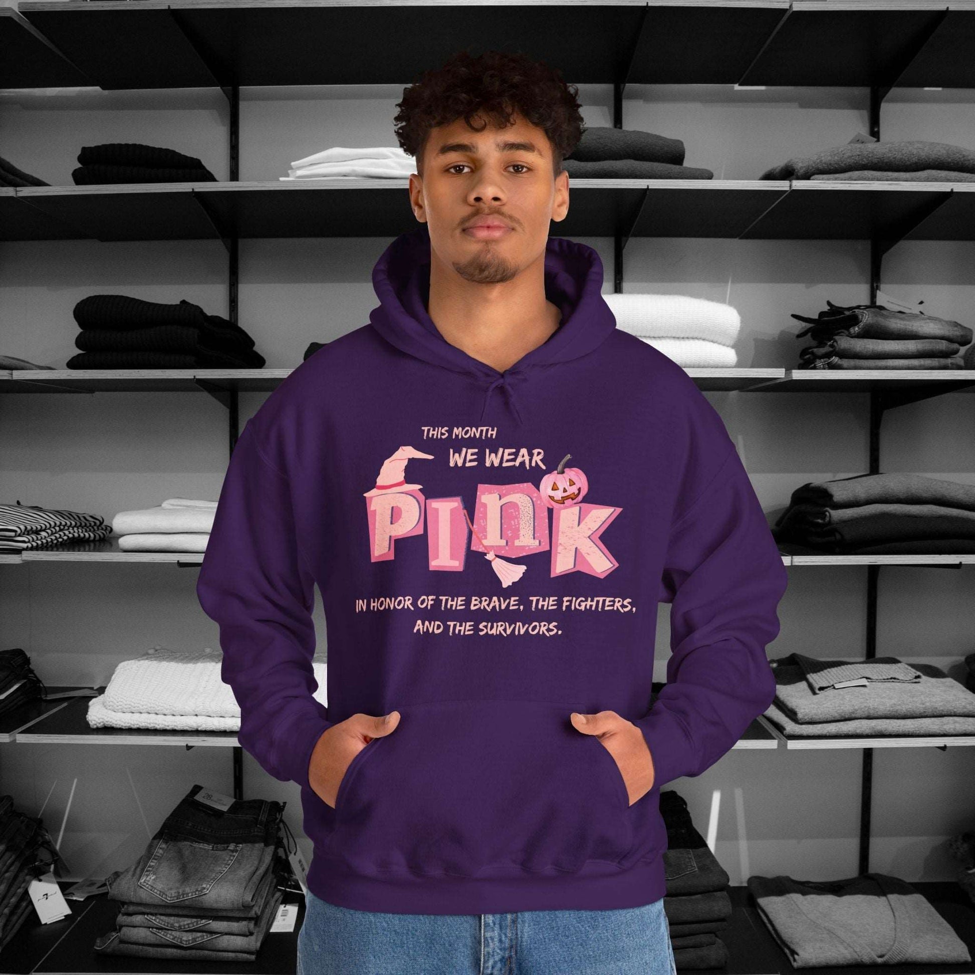 Breast Cancer Awareness Hoodie -This Month We Wear Pink. Stand strong in this empowering hoodie that speaks to both the inner and outer strength of canser sufferers.