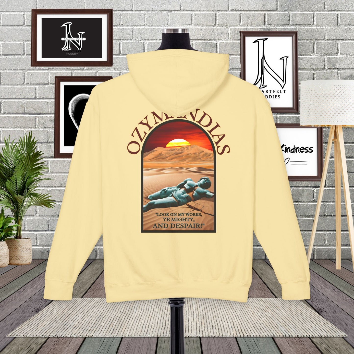 Percy Bysshe Shelley's "Ozymandias" our poetry clothing features a vivid desert sunset, a fallen statue, and the quote,  "Look on my works, ye mighty, and despair". 