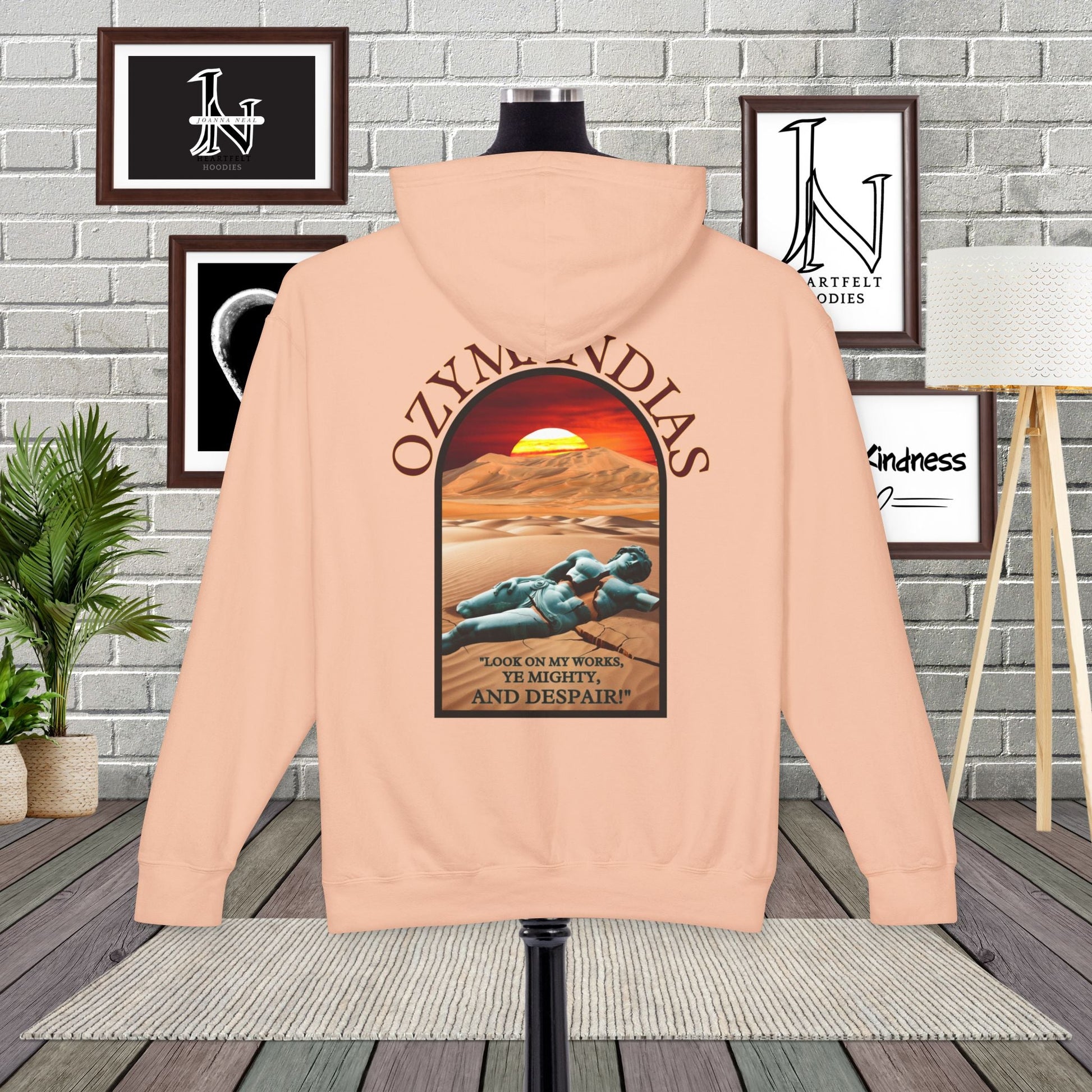 Percy Bysshe Shelley's "Ozymandias" our poetry clothing features a vivid desert sunset, a fallen statue, and the quote,  "Look on my works, ye mighty, and despair". 