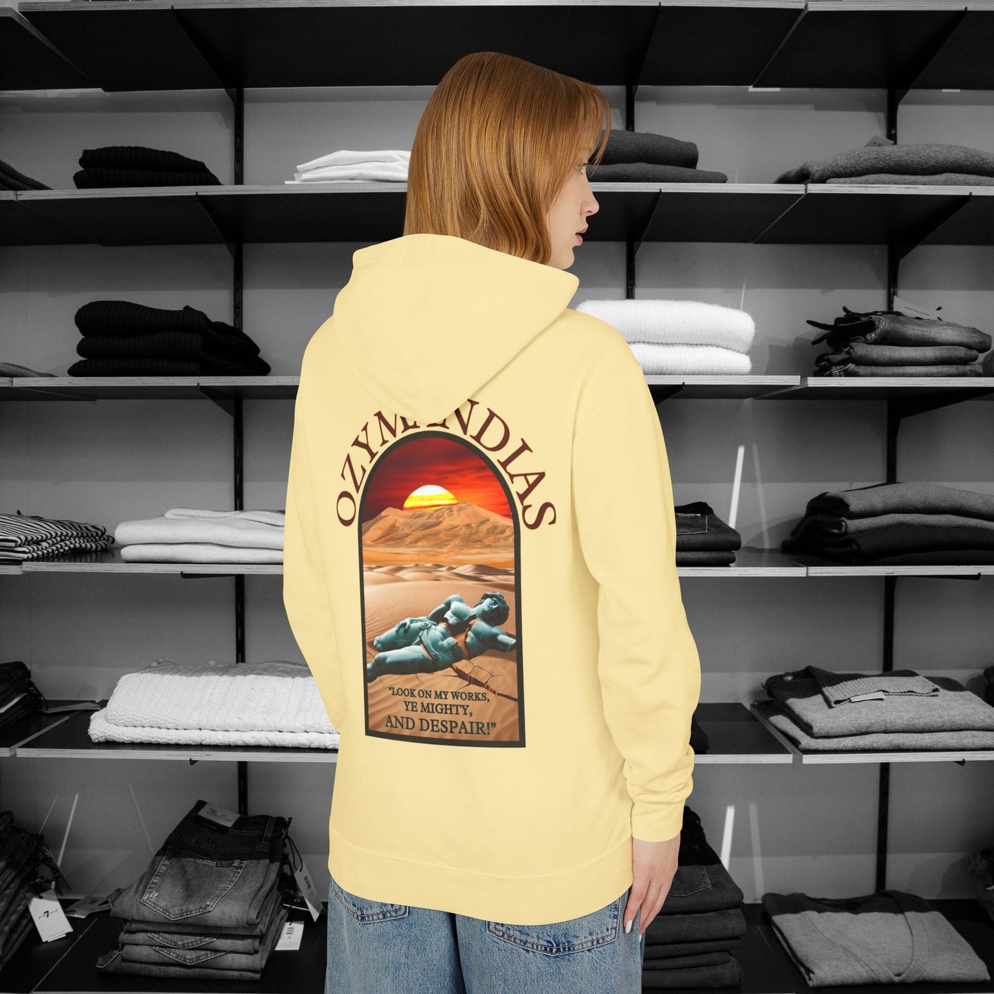 Percy Bysshe Shelley's "Ozymandias" our poetry clothing features a vivid desert sunset, a fallen statue, and the quote,  "Look on my works, ye mighty, and despair". 