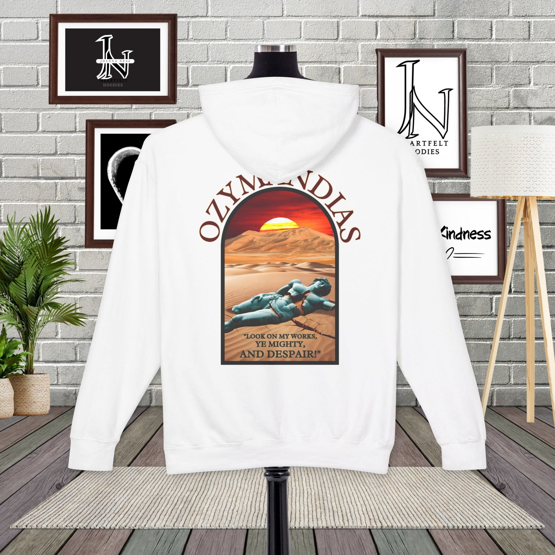 Percy Bysshe Shelley's "Ozymandias" our poetry clothing features a vivid desert sunset, a fallen statue, and the quote,  "Look on my works, ye mighty, and despair". 