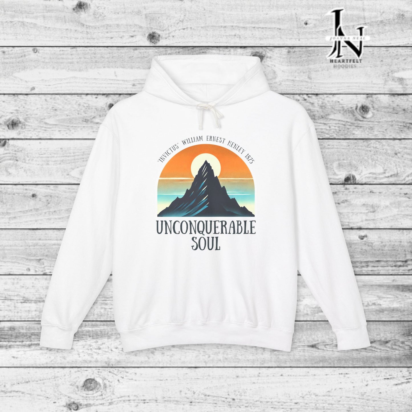 This Piece of Poetry Clothing features a bold and motivational statement: "I am the captain of my soul," paired with a stunning mountain scene under a rising sun.