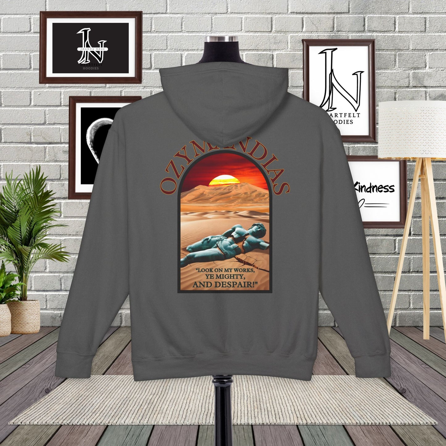 Percy Bysshe Shelley's "Ozymandias" our poetry clothing features a vivid desert sunset, a fallen statue, and the quote,  "Look on my works, ye mighty, and despair". 