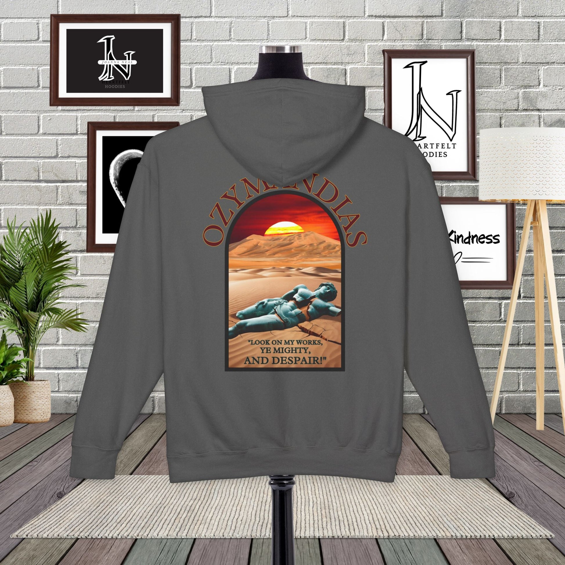 Percy Bysshe Shelley's "Ozymandias" our poetry clothing features a vivid desert sunset, a fallen statue, and the quote,  "Look on my works, ye mighty, and despair". 