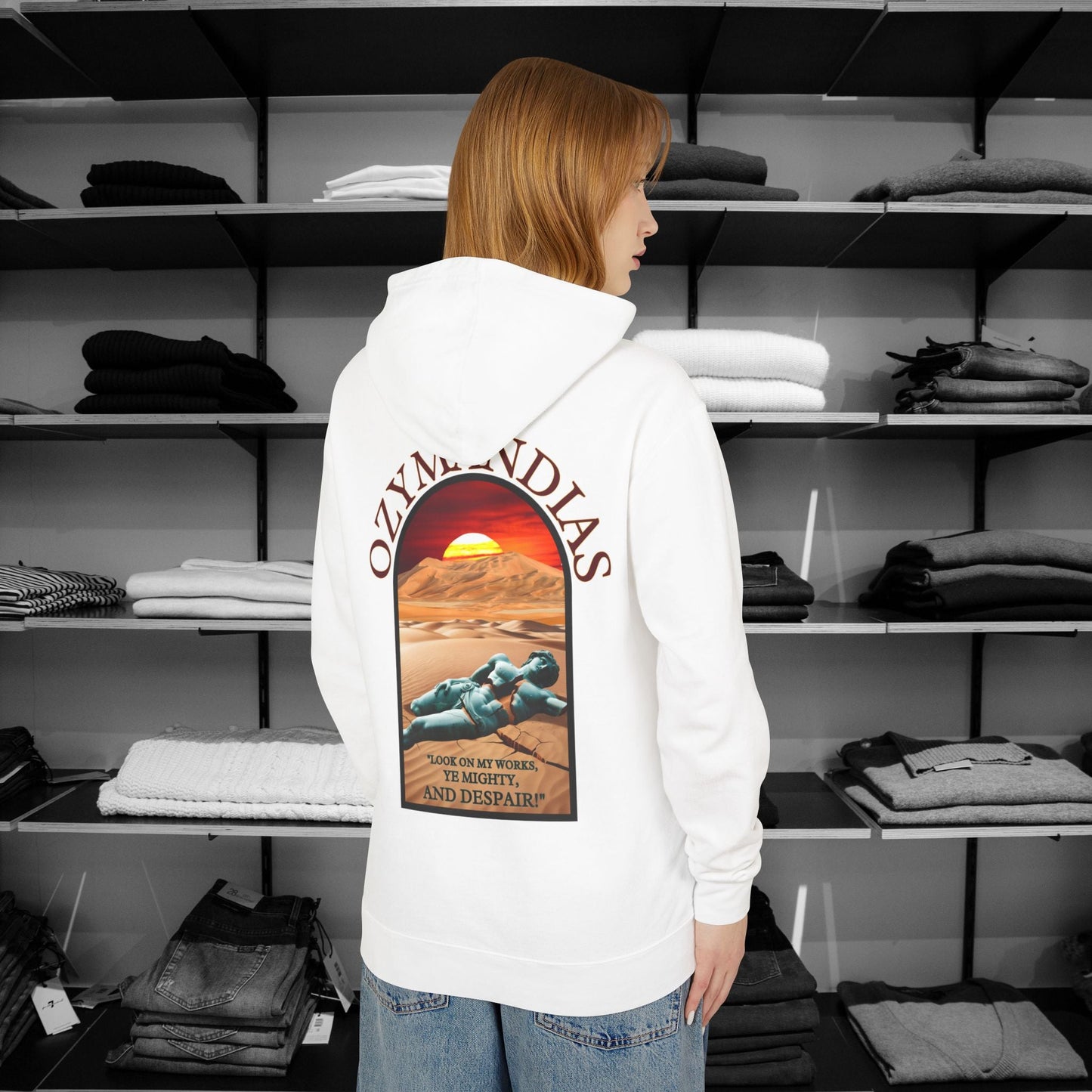 Percy Bysshe Shelley's "Ozymandias" our poetry clothing features a vivid desert sunset, a fallen statue, and the quote,  "Look on my works, ye mighty, and despair". 