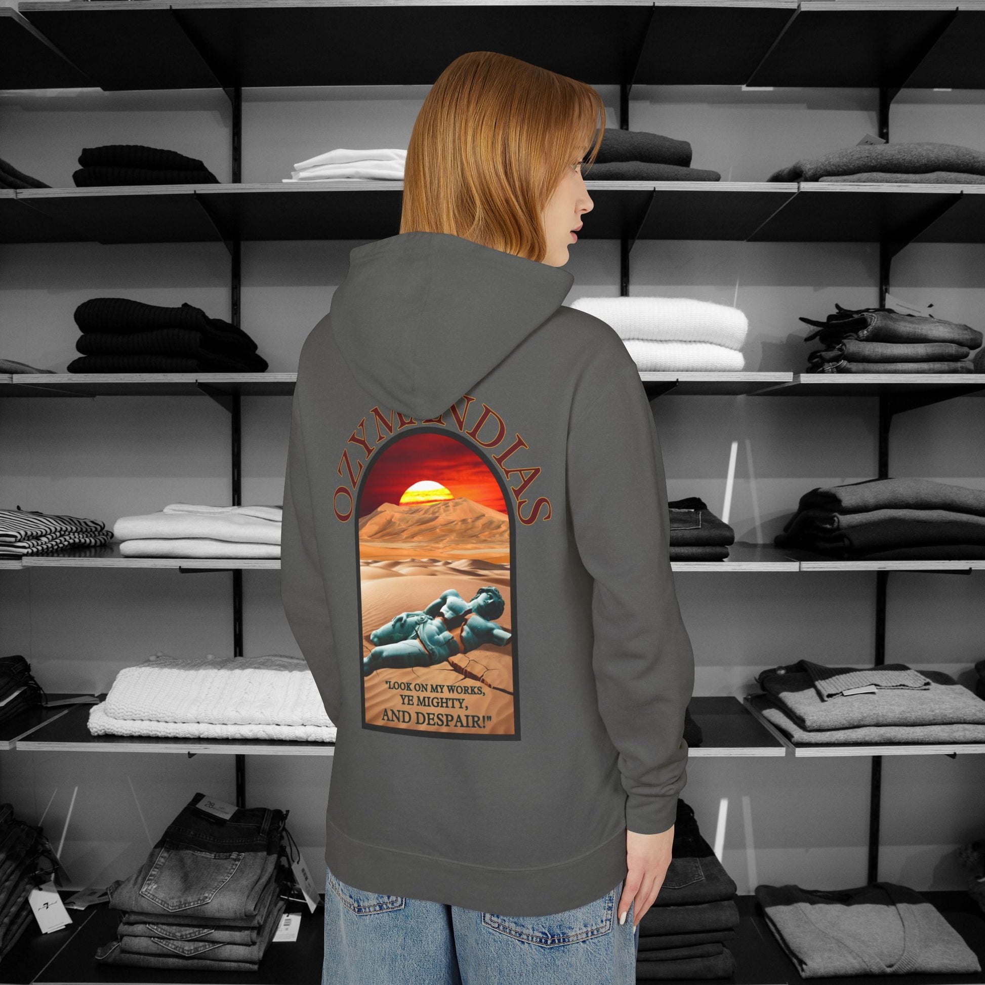 Percy Bysshe Shelley's "Ozymandias" our poetry clothing features a vivid desert sunset, a fallen statue, and the quote,  "Look on my works, ye mighty, and despair". 