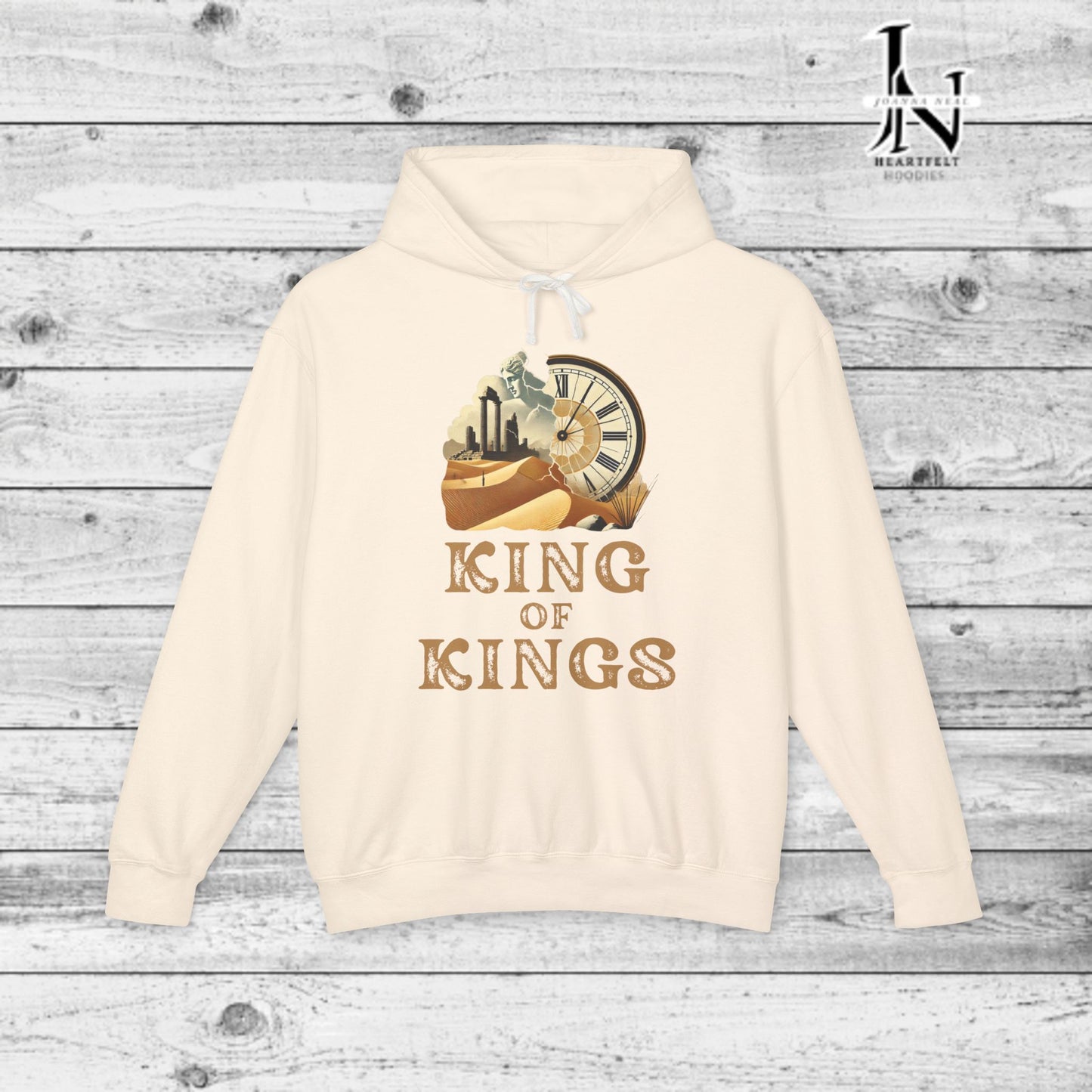 Poetry Clothing - Featuring a vivid desert sunset, a fallen statue, and the iconic quote, "Look on my works, ye mighty, and despair," this hoodie captures the impermanence of power and the beauty of art. The front features the majestic phrase "King of Kings" with a timeless design showcasing a crumbling statue, a clock symbolizing the passage of time, and desert ruins. On the back, the unforgettable quote, "Look on my works, ye mighty, and despair,