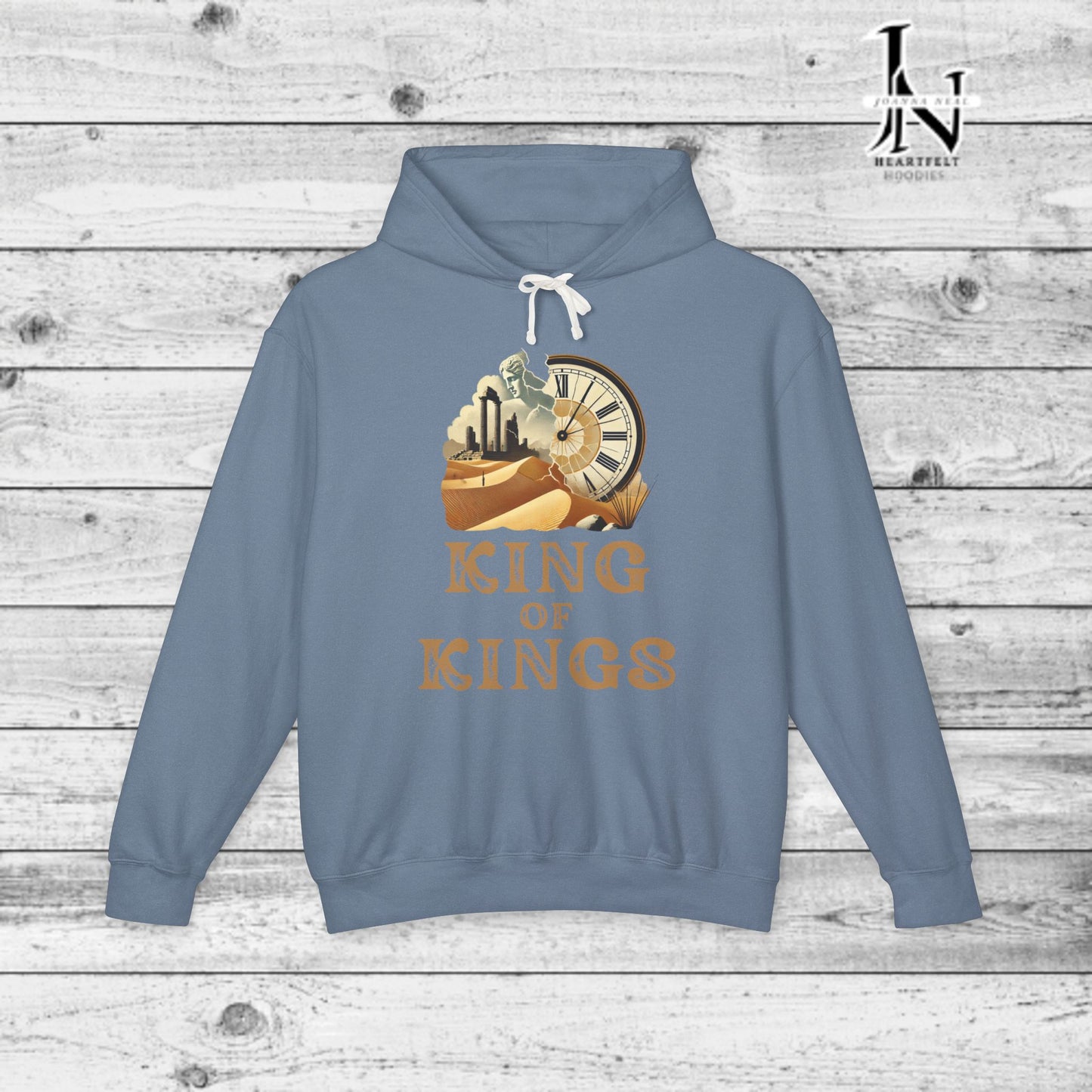 Poetry Clothing - Featuring a vivid desert sunset, a fallen statue, and the iconic quote, "Look on my works, ye mighty, and despair," this hoodie captures the impermanence of power and the beauty of art. The front features the majestic phrase "King of Kings" with a timeless design showcasing a crumbling statue, a clock symbolizing the passage of time, and desert ruins. On the back, the unforgettable quote, "Look on my works, ye mighty, and despair,