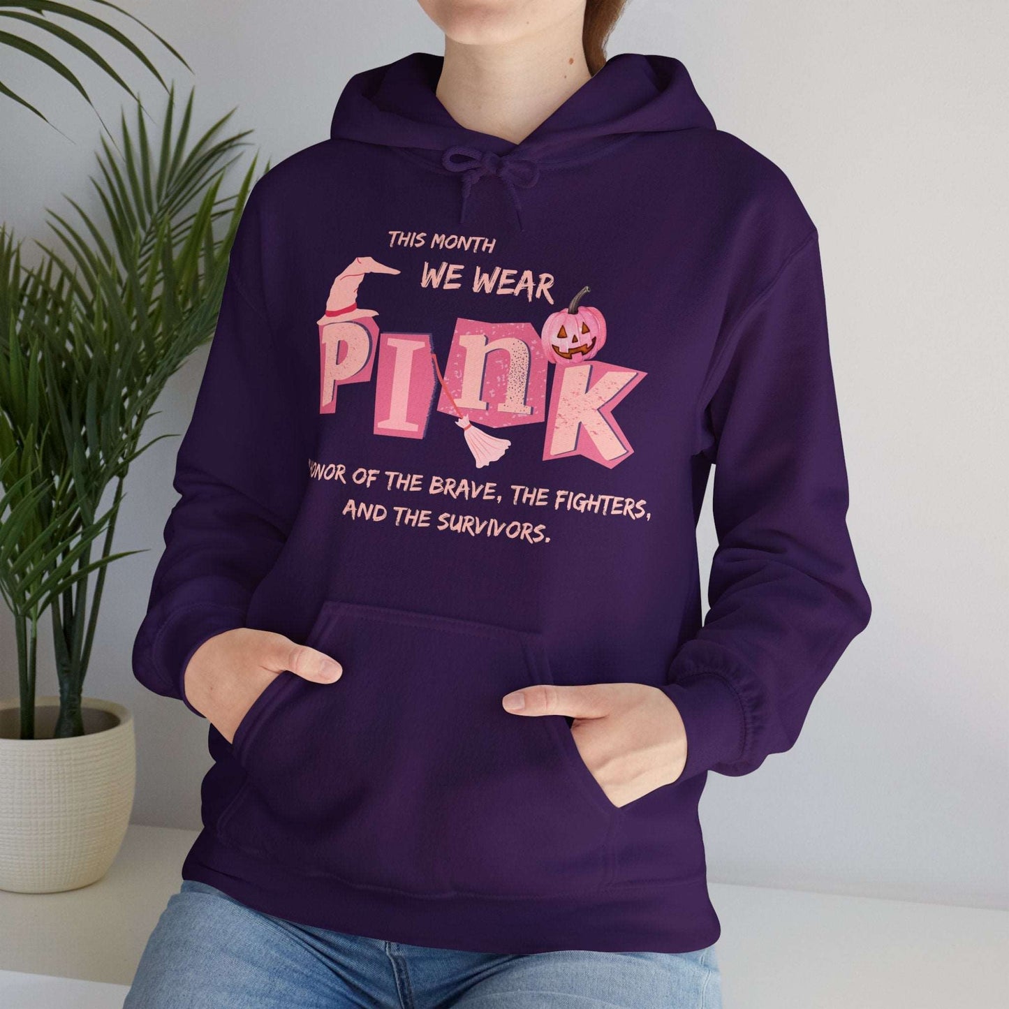 Breast Cancer Awareness Hoodie -This Month We Wear Pink. Stand strong in this empowering hoodie that speaks to both the inner and outer strength of canser sufferers.