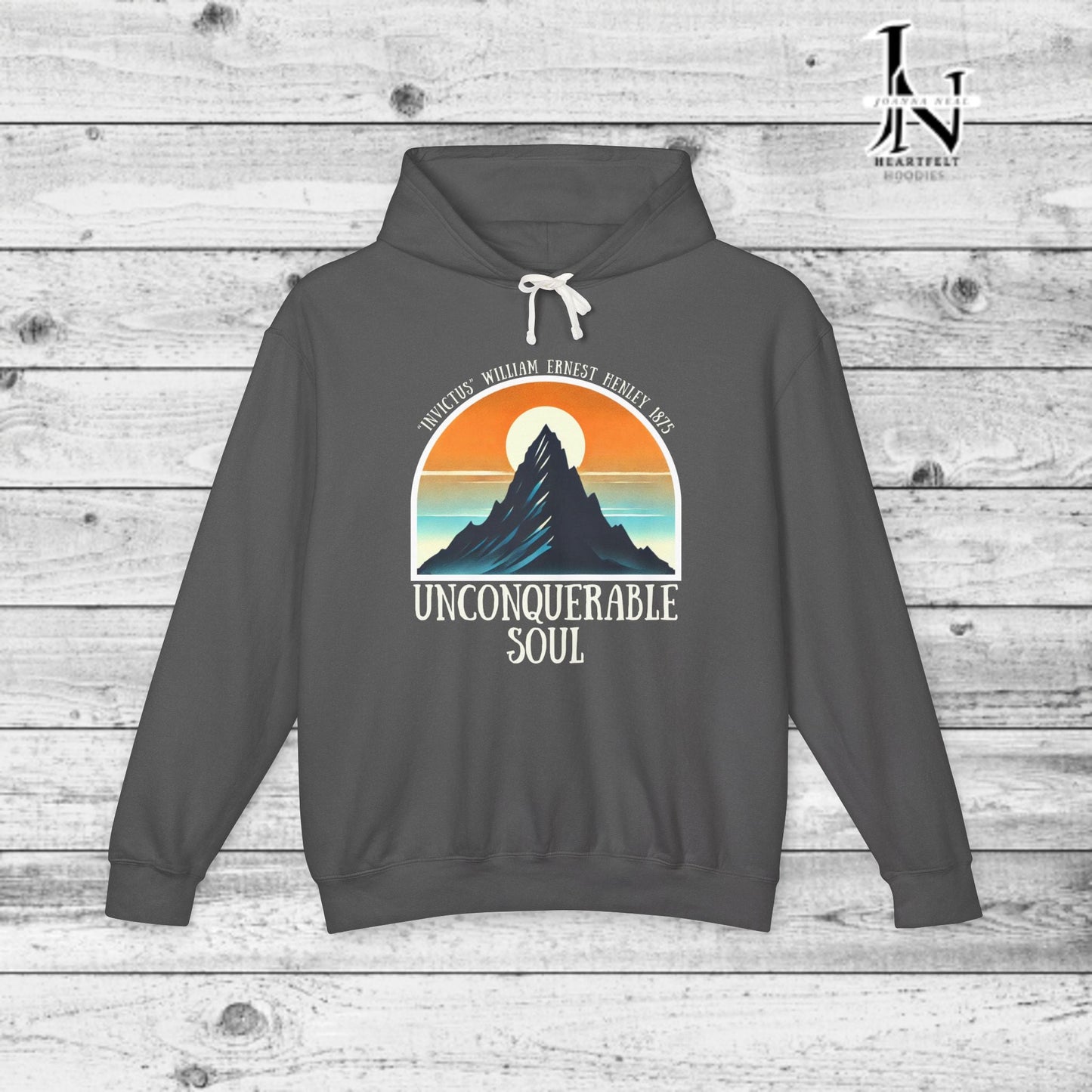 This Piece of Poetry Clothing features a bold and motivational statement: "I am the captain of my soul," paired with a stunning mountain scene under a rising sun.