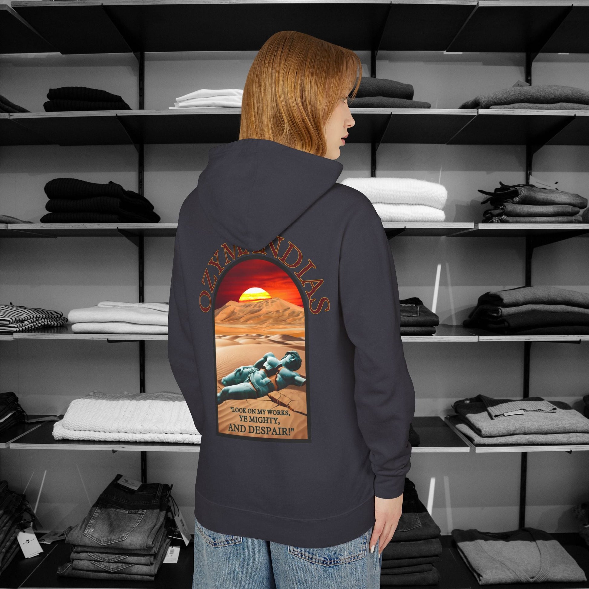 Percy Bysshe Shelley's "Ozymandias" our poetry clothing features a vivid desert sunset, a fallen statue, and the quote,  "Look on my works, ye mighty, and despair". 