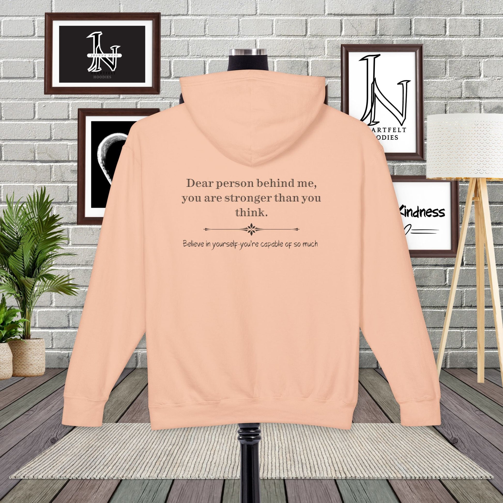 Elevate your everyday wear with a Dear Person Behind Me hoodie, designed for comfort and style. It spreads kindness with a message "you are stronger than you think".