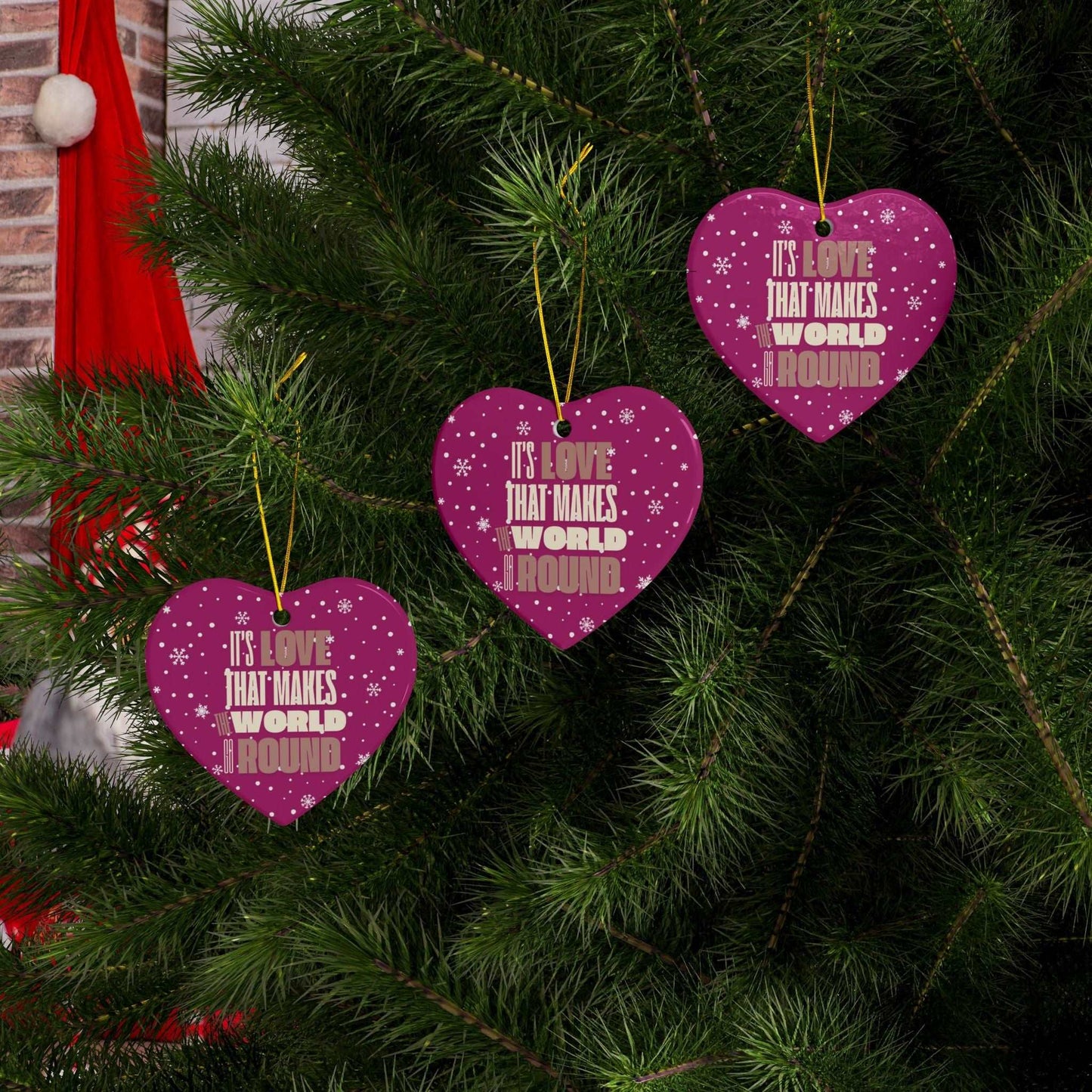 ransform your Christmas tree into a beacon of hope and love at Heartfelt Hoodies & These premium ceramic Christmas ornaments It's Love That Makes The World Go Round