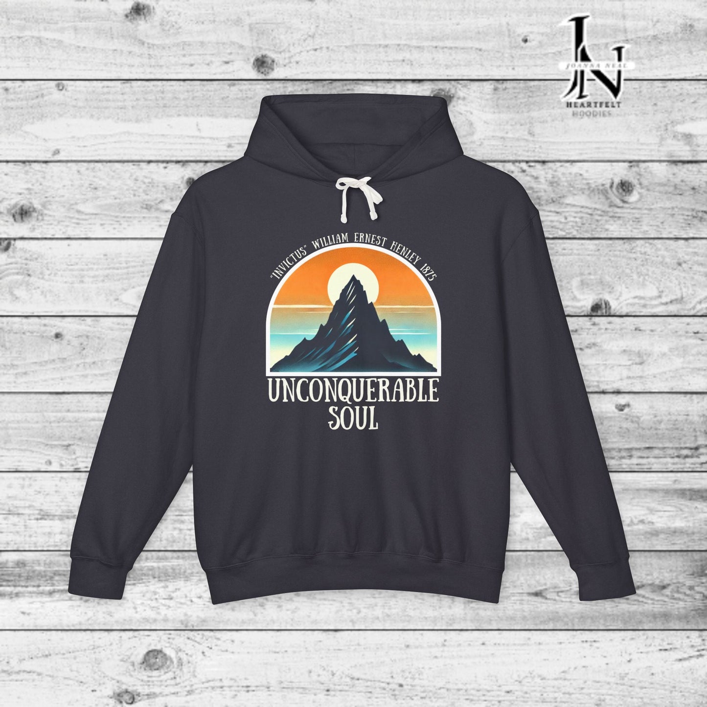 This Piece of Poetry Clothing features a bold and motivational statement: "I am the captain of my soul," paired with a stunning mountain scene under a rising sun.