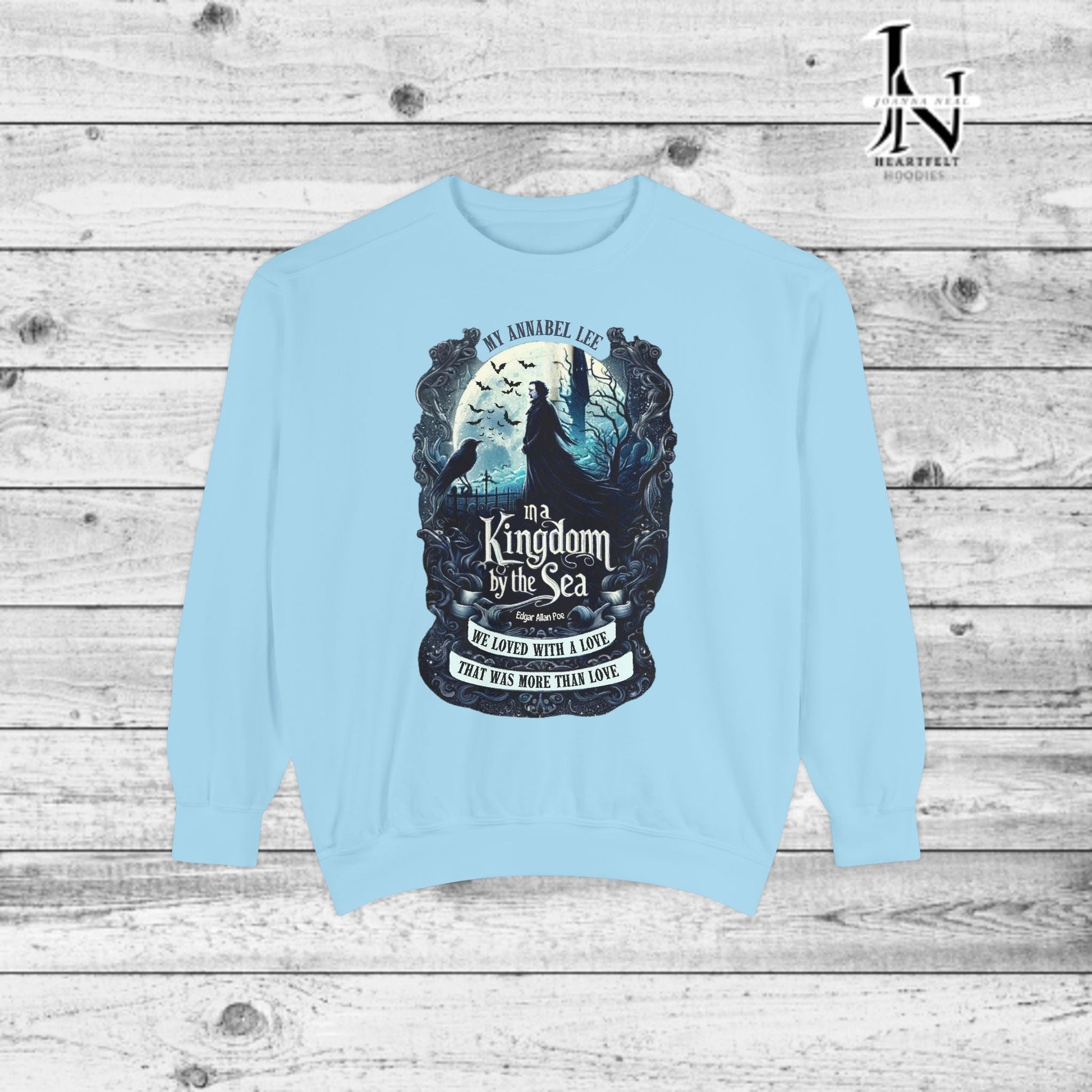 Step into the haunting beauty of Edgar Allan Poe’s timeless poem with our Poetry Clothing line, This Annabel Lee Sweatshirt Features a moonlit sea and gothic castle