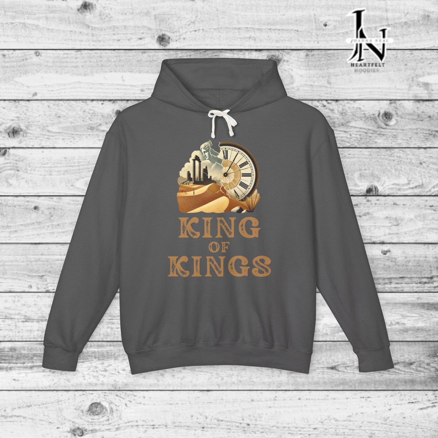 Poetry Clothing - Featuring a vivid desert sunset, a fallen statue, and the iconic quote, "Look on my works, ye mighty, and despair," this hoodie captures the impermanence of power and the beauty of art. The front features the majestic phrase "King of Kings" with a timeless design showcasing a crumbling statue, a clock symbolizing the passage of time, and desert ruins. On the back, the unforgettable quote, "Look on my works, ye mighty, and despair,