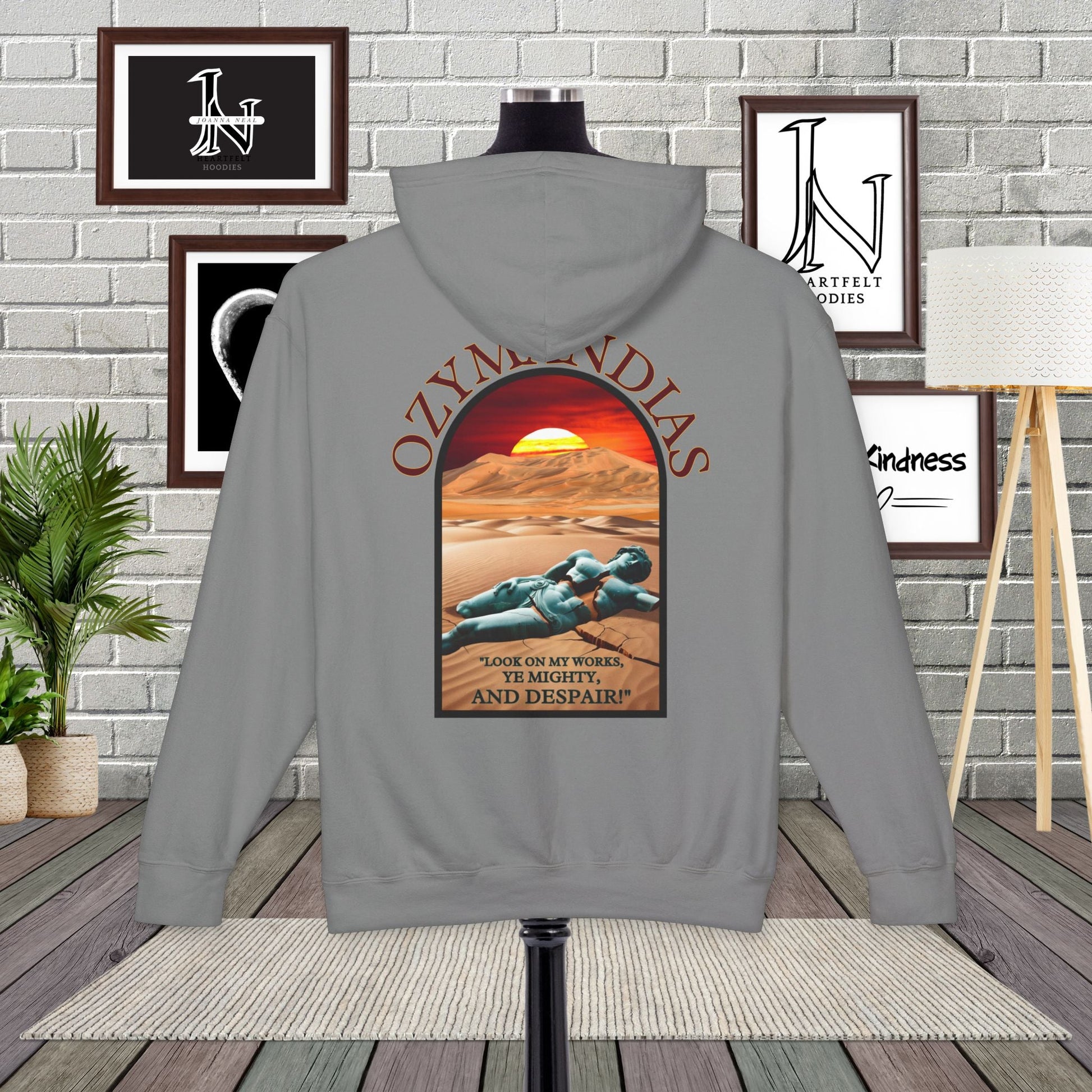 Percy Bysshe Shelley's "Ozymandias" our poetry clothing features a vivid desert sunset, a fallen statue, and the quote,  "Look on my works, ye mighty, and despair". 