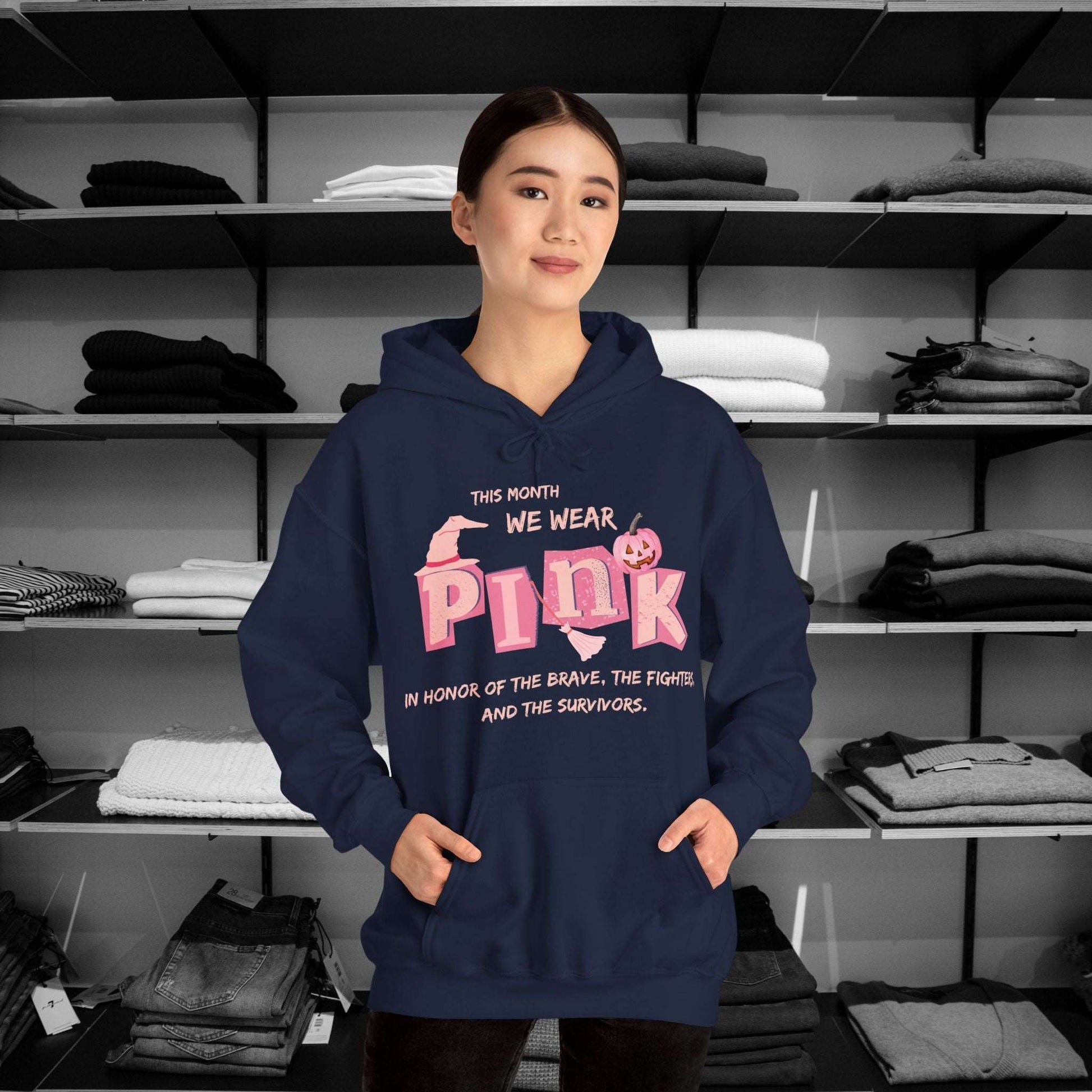 Breast Cancer Awareness Hoodie -This Month We Wear Pink. Stand strong in this empowering hoodie that speaks to both the inner and outer strength of canser sufferers.