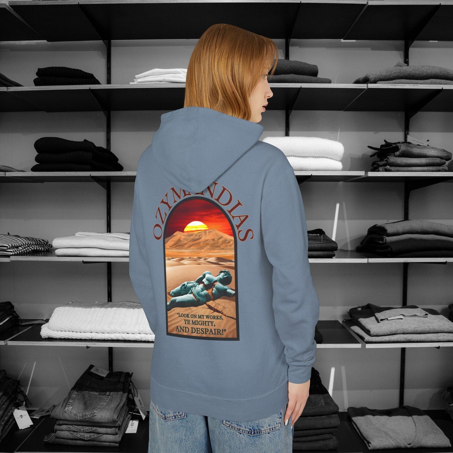 Percy Bysshe Shelley's "Ozymandias" our poetry clothing features a vivid desert sunset, a fallen statue, and the quote,  "Look on my works, ye mighty, and despair". 