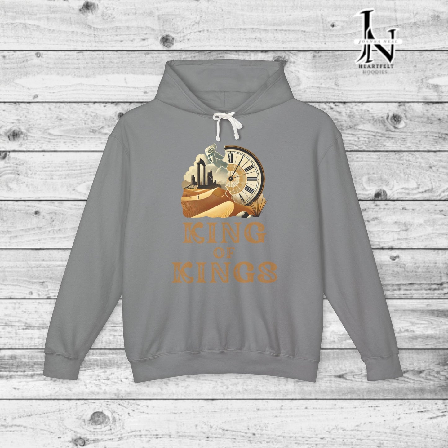 Poetry Clothing - Featuring a vivid desert sunset, a fallen statue, and the iconic quote, "Look on my works, ye mighty, and despair," this hoodie captures the impermanence of power and the beauty of art. The front features the majestic phrase "King of Kings" with a timeless design showcasing a crumbling statue, a clock symbolizing the passage of time, and desert ruins. On the back, the unforgettable quote, "Look on my works, ye mighty, and despair,