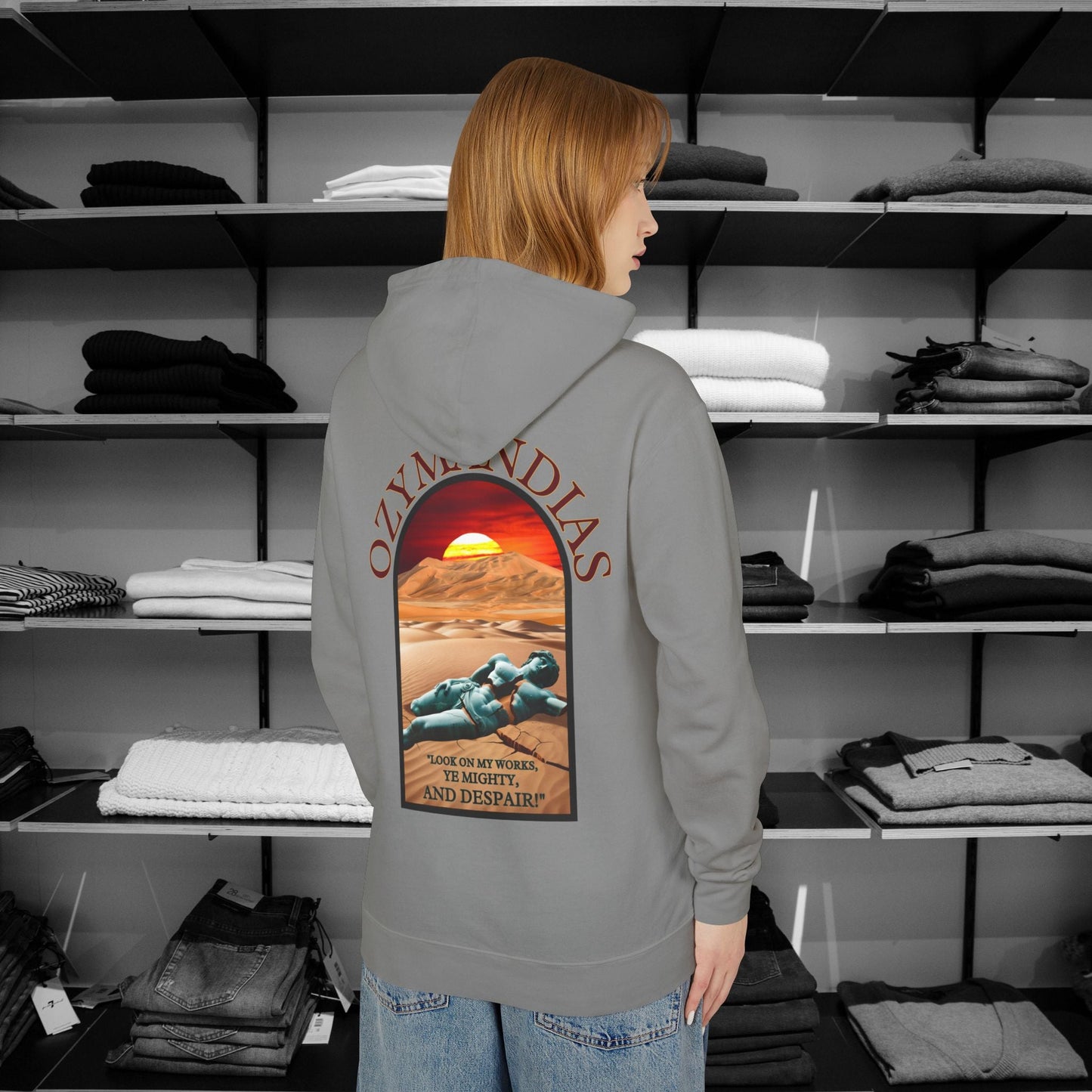 Percy Bysshe Shelley's "Ozymandias" our poetry clothing features a vivid desert sunset, a fallen statue, and the quote,  "Look on my works, ye mighty, and despair". 