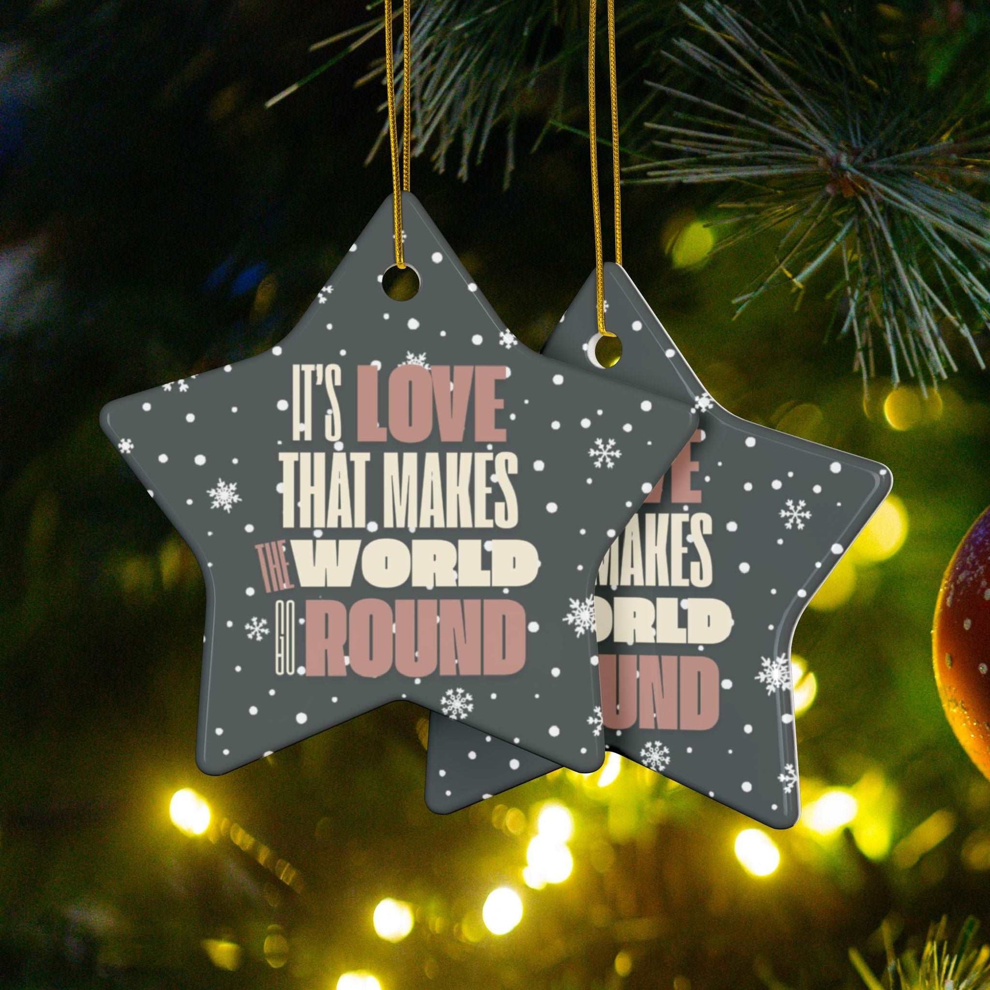 ransform your Christmas tree into a beacon of hope and love at Heartfelt Hoodies & These premium ceramic Christmas ornaments It's Love That Makes The World Go Round